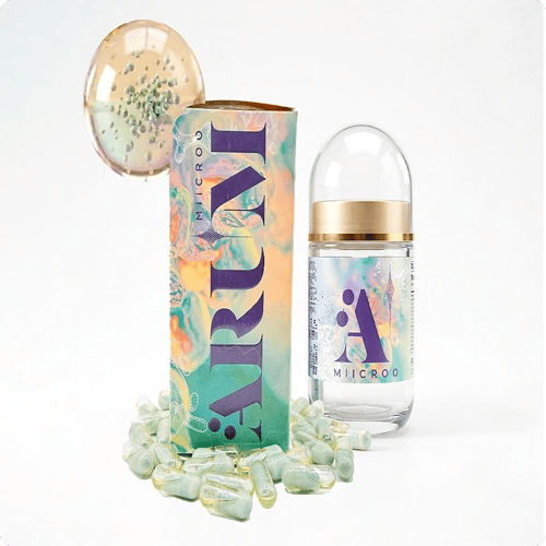 Colorful product box, scattered capsules, clear bottle
