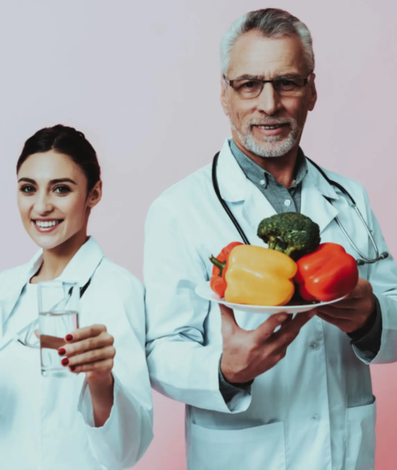 Two doctors promoting healthy eating and hydration